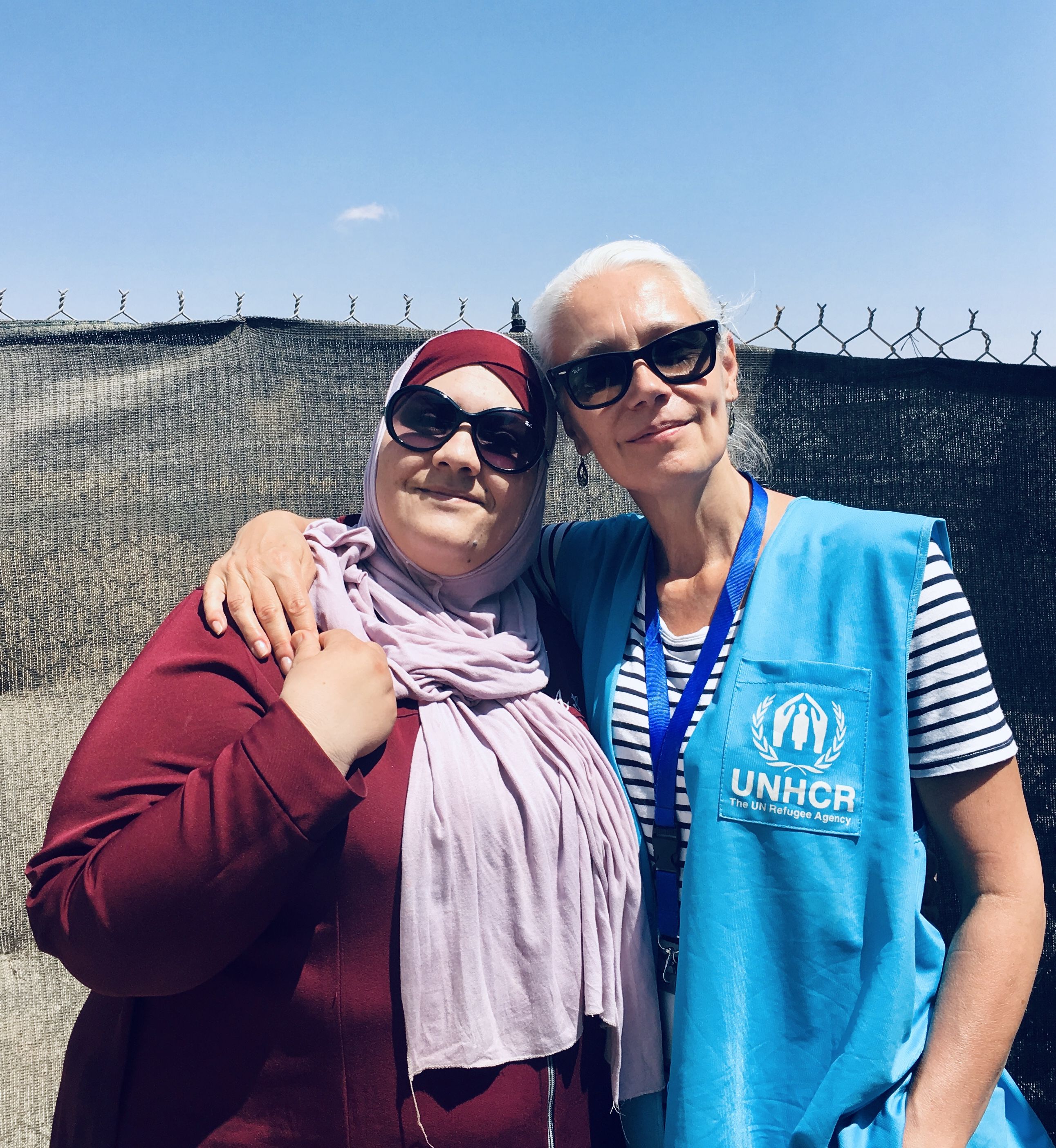 Standing left to right, Ahlam and Helen.