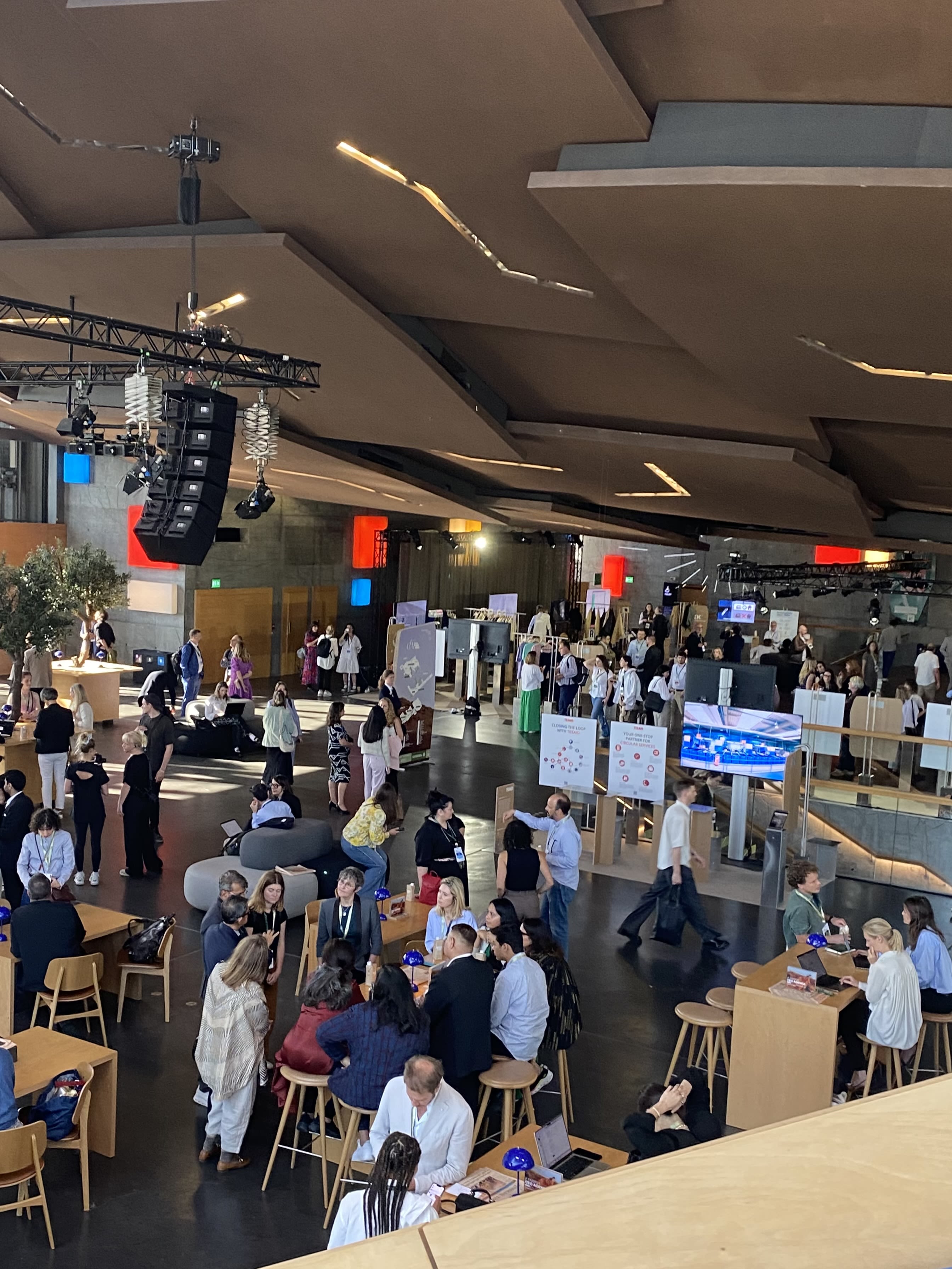 A group of people in a large room.