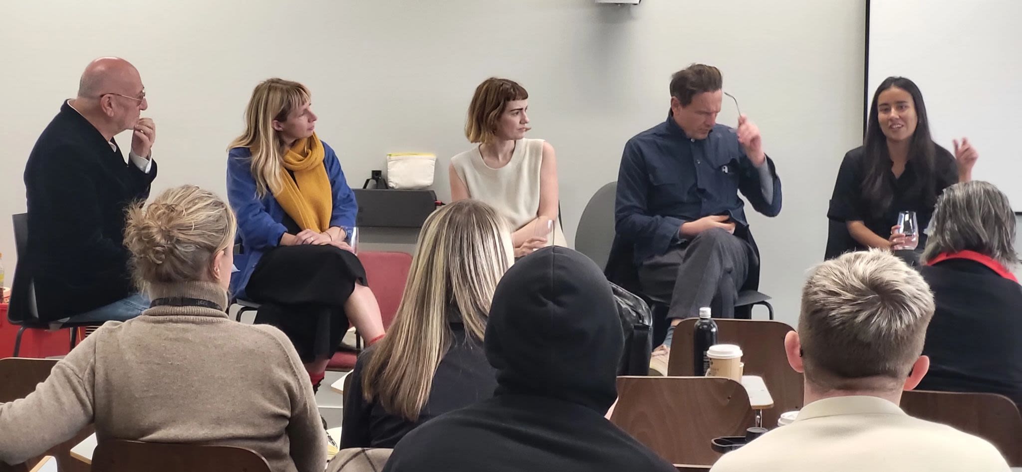 People sitting and discussing.