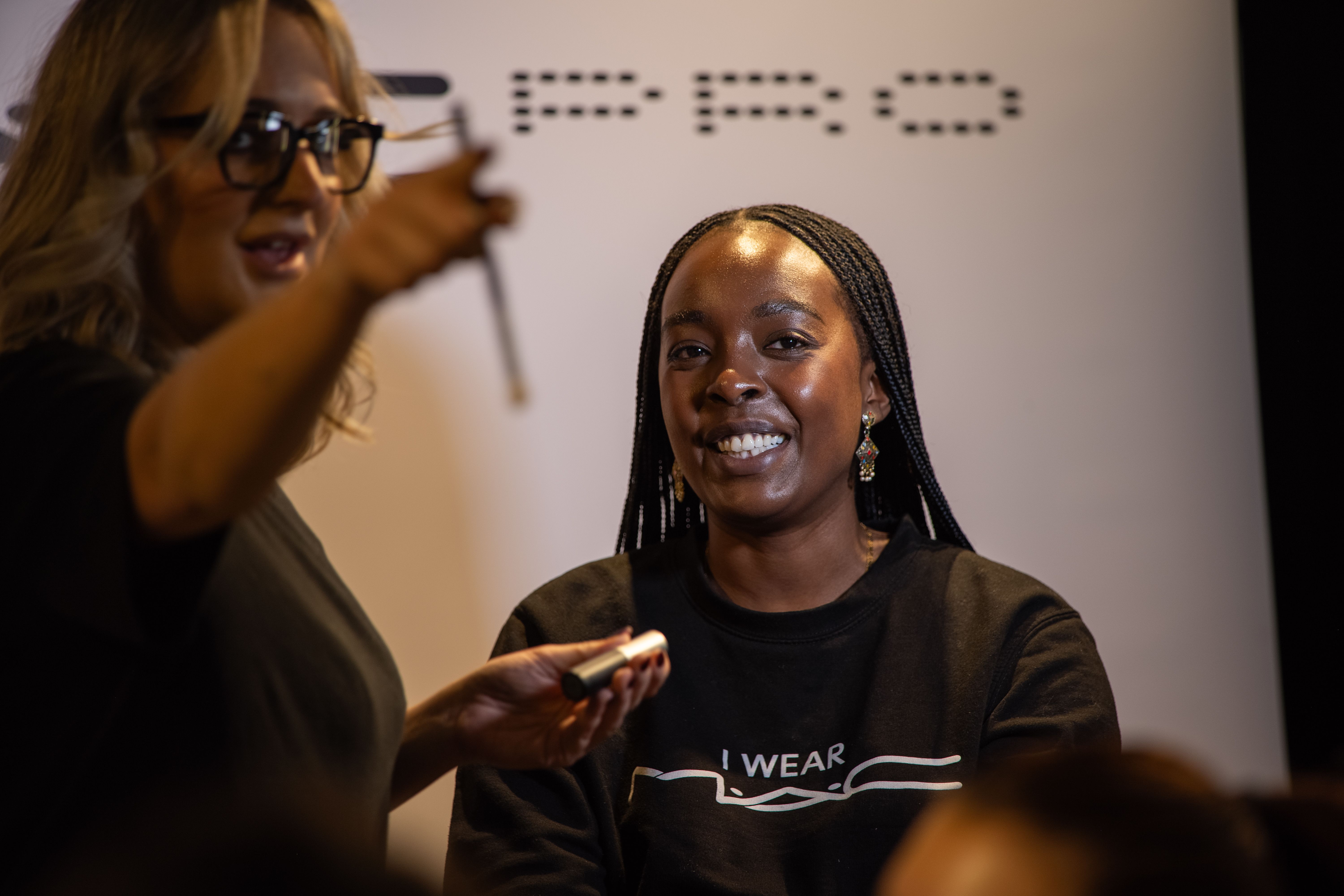 A model smiling at the camera