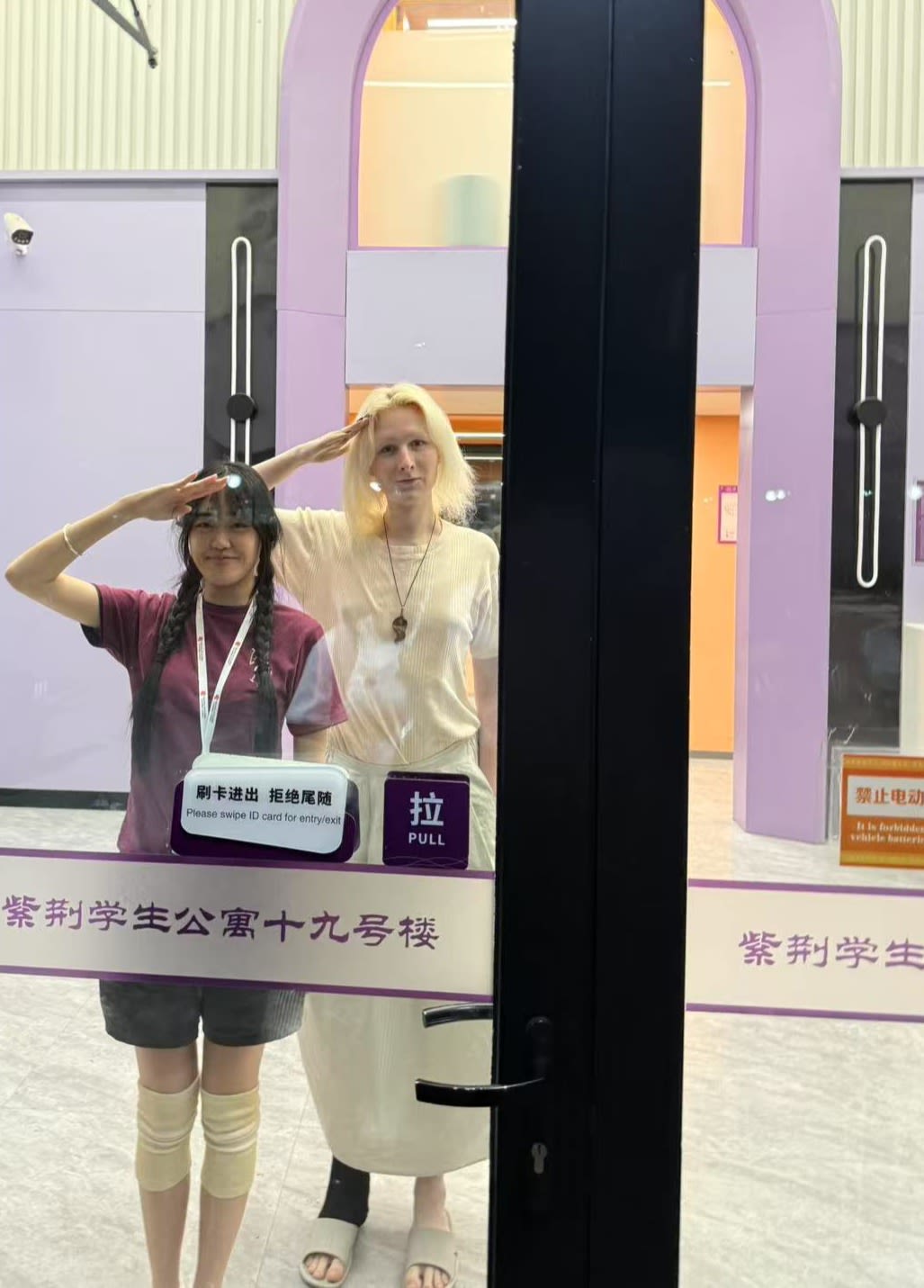Two females saluting