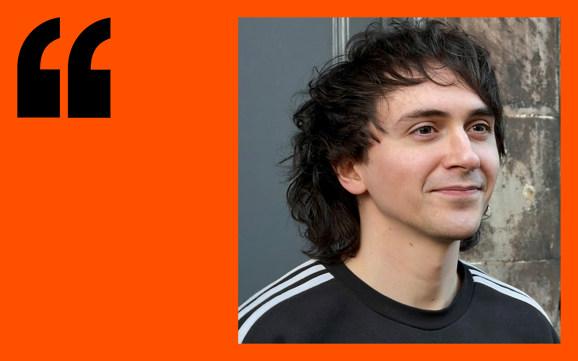 Headshot of male student on orange background