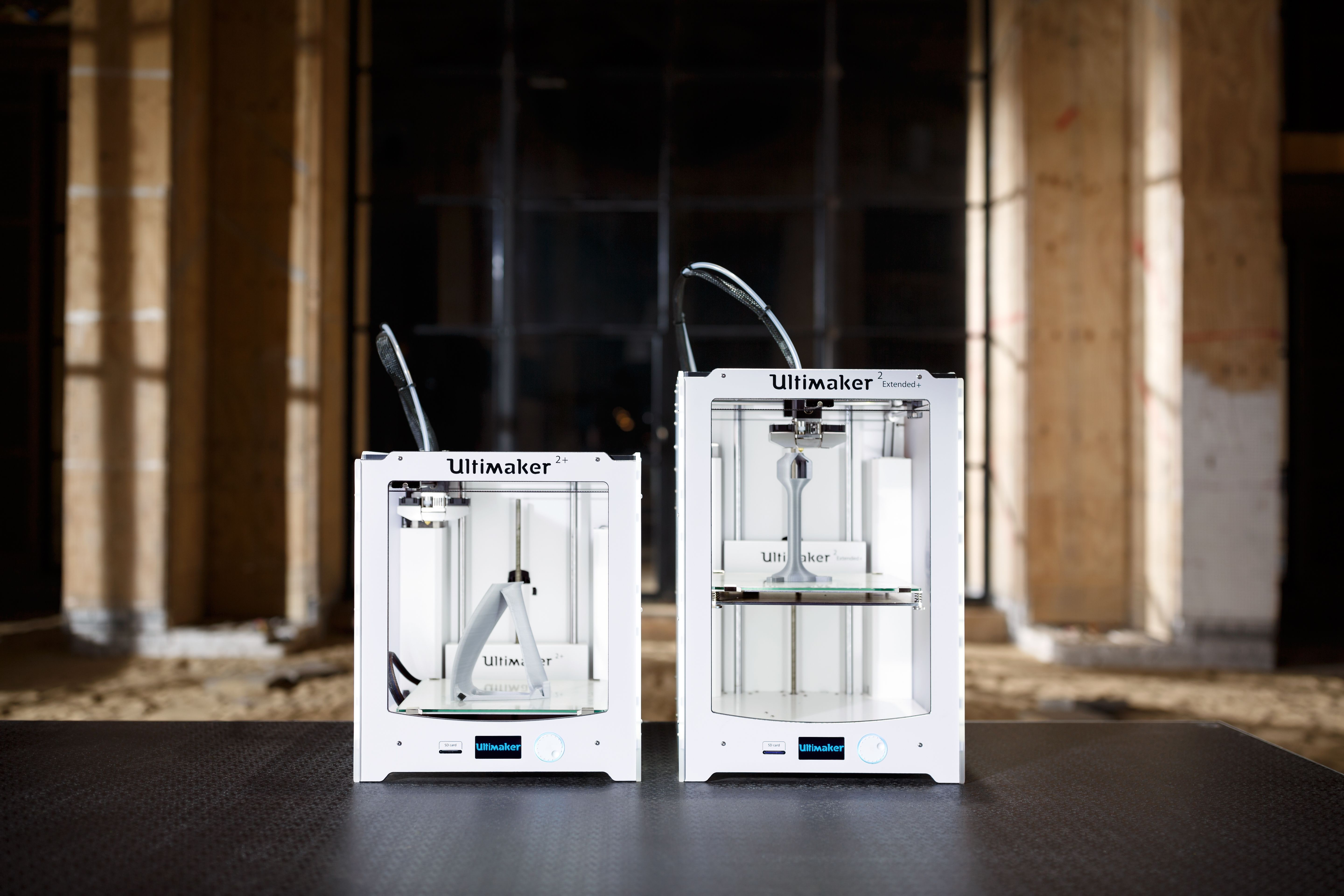 Photo of 2 Ultimaker 3D printers.