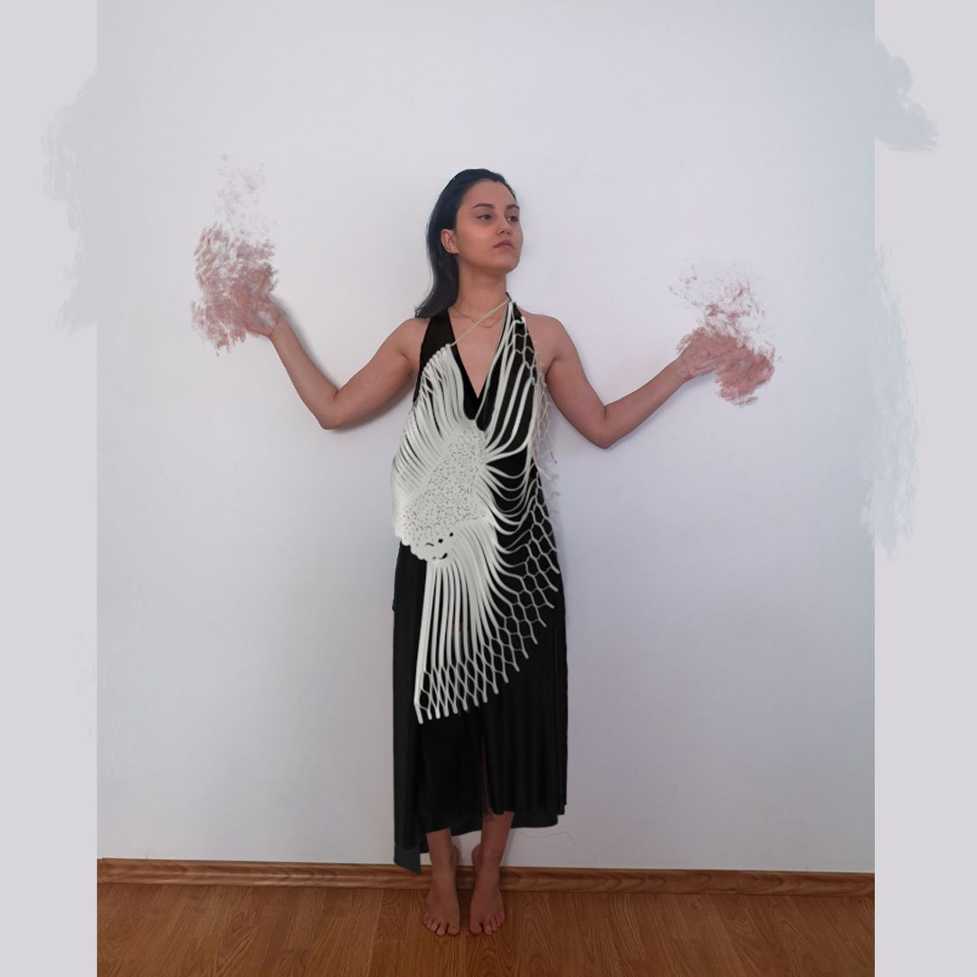 Photo of Ilinca wearing 3D striped black and white dress