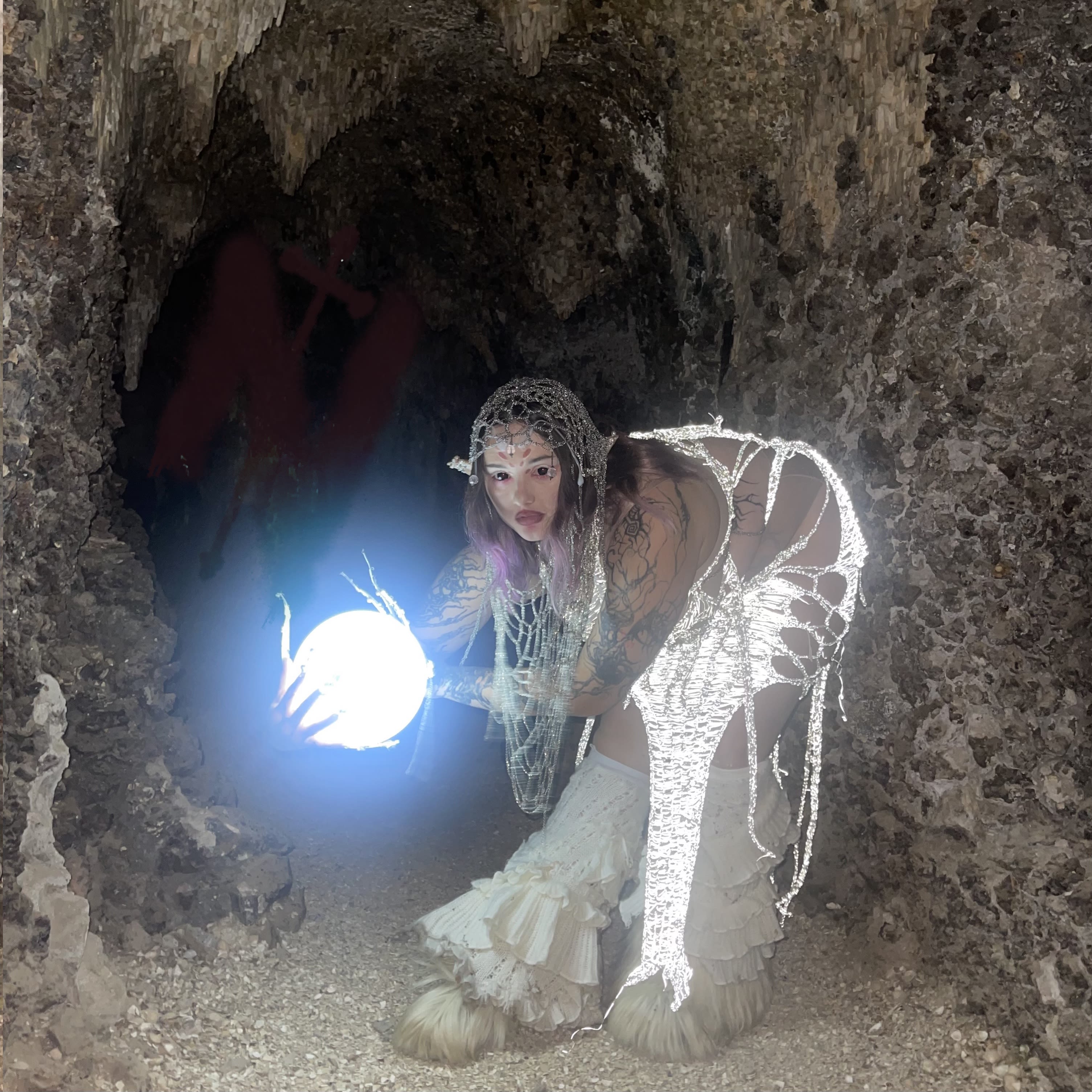 Ghost like fairytale creature in a cave