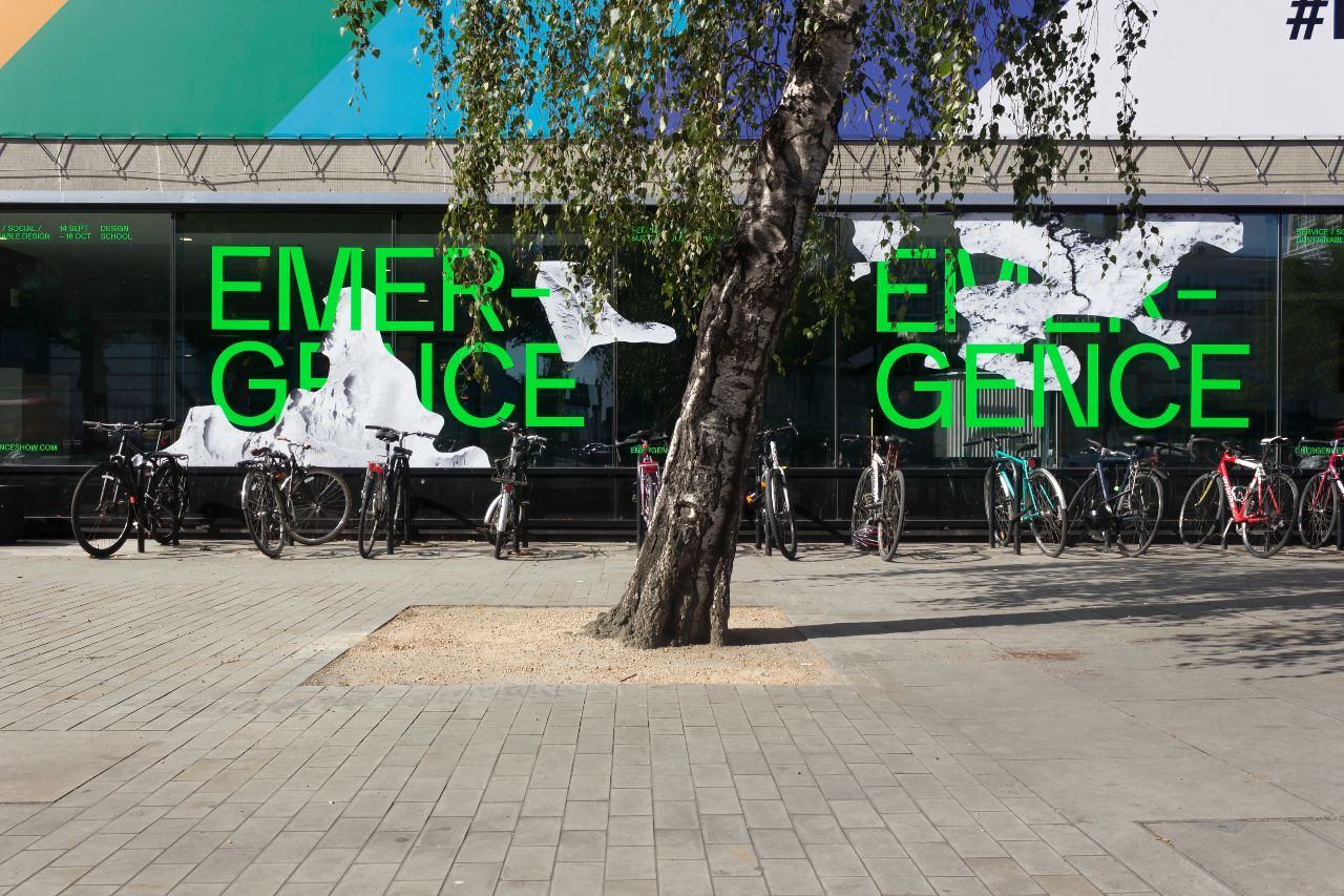 A building with the word emergence written on it in green