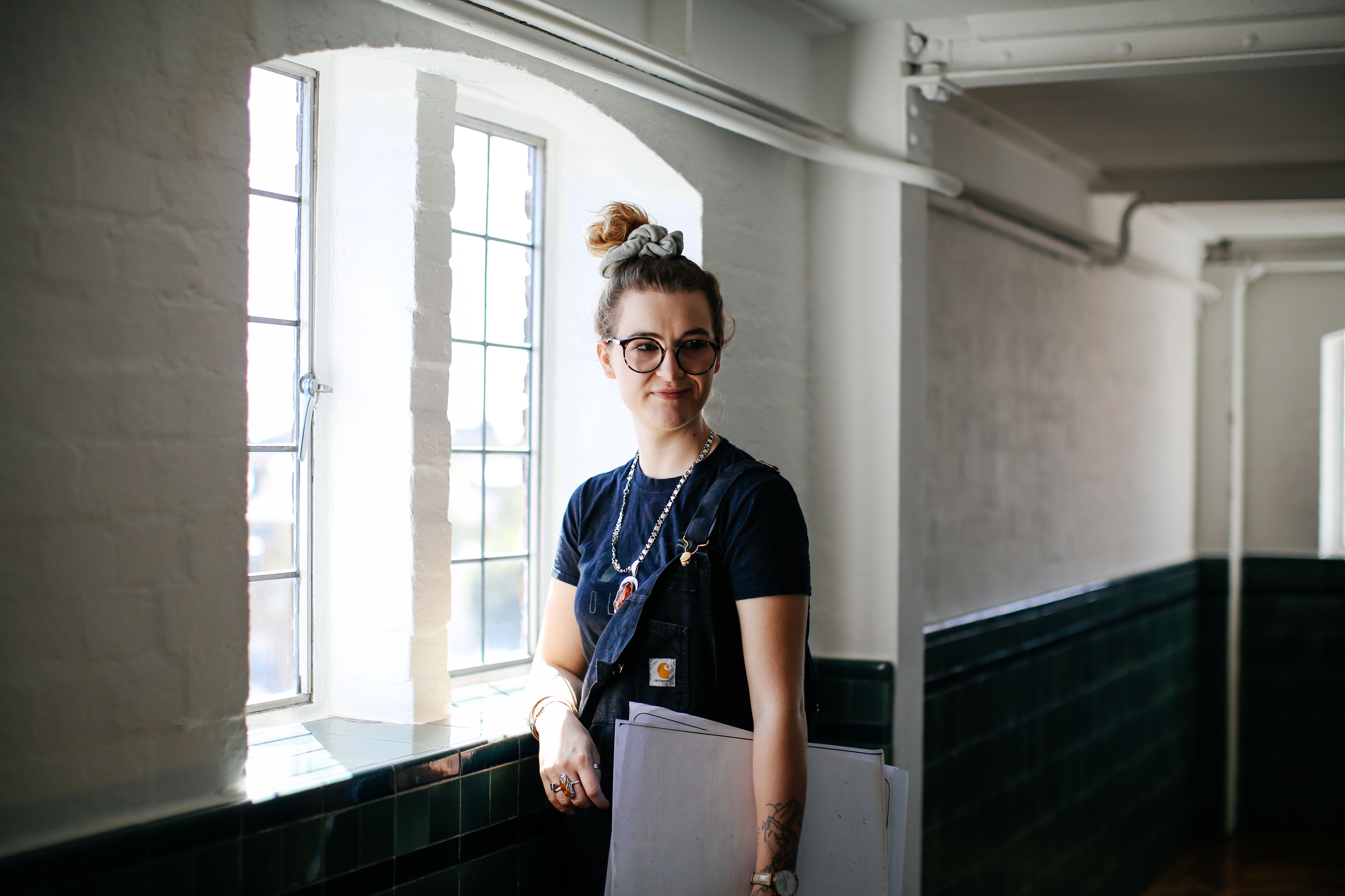 Girl with portfolio in the studio London