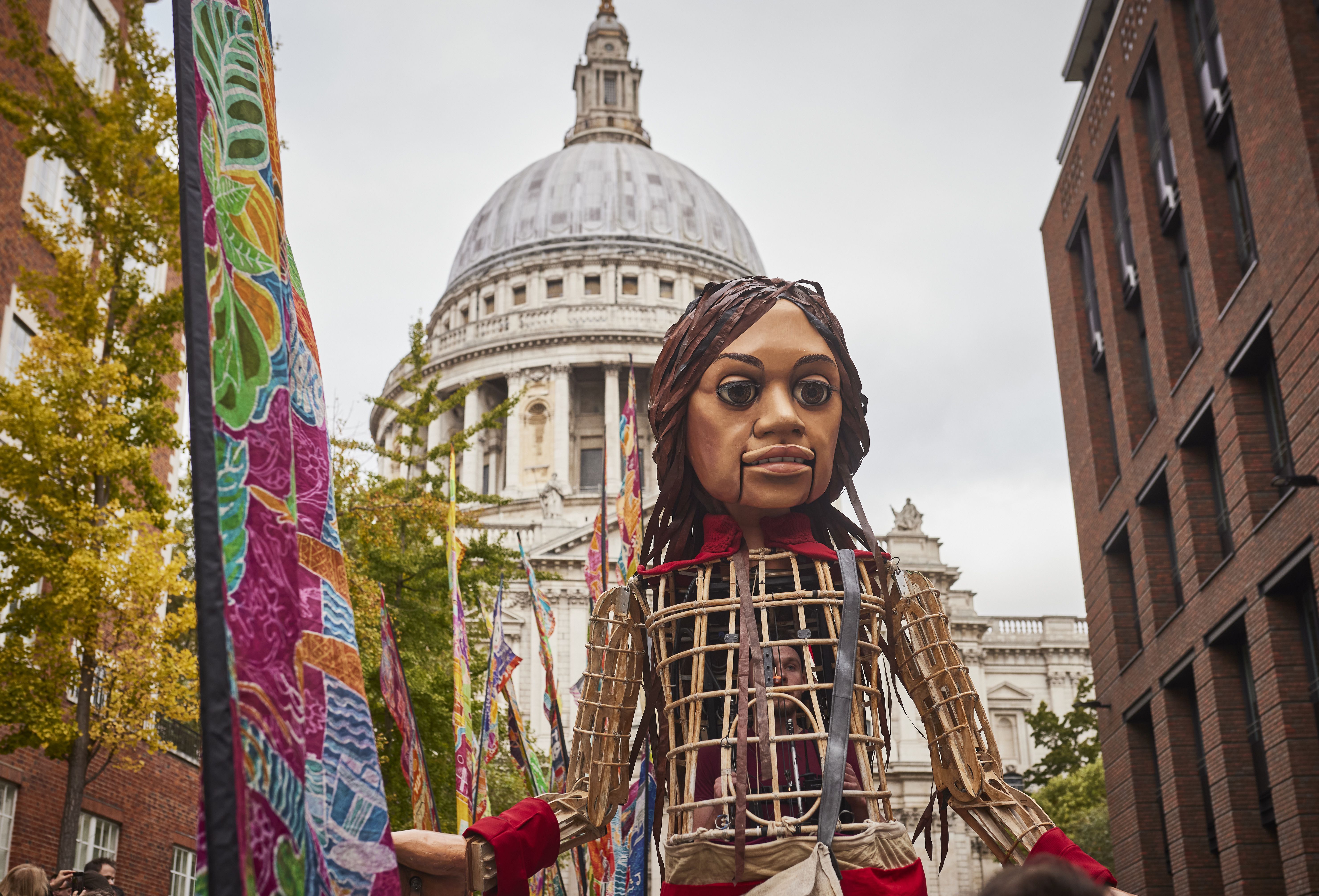 The giant puppet + human rights symbol Little Amal shot at St Paul's London