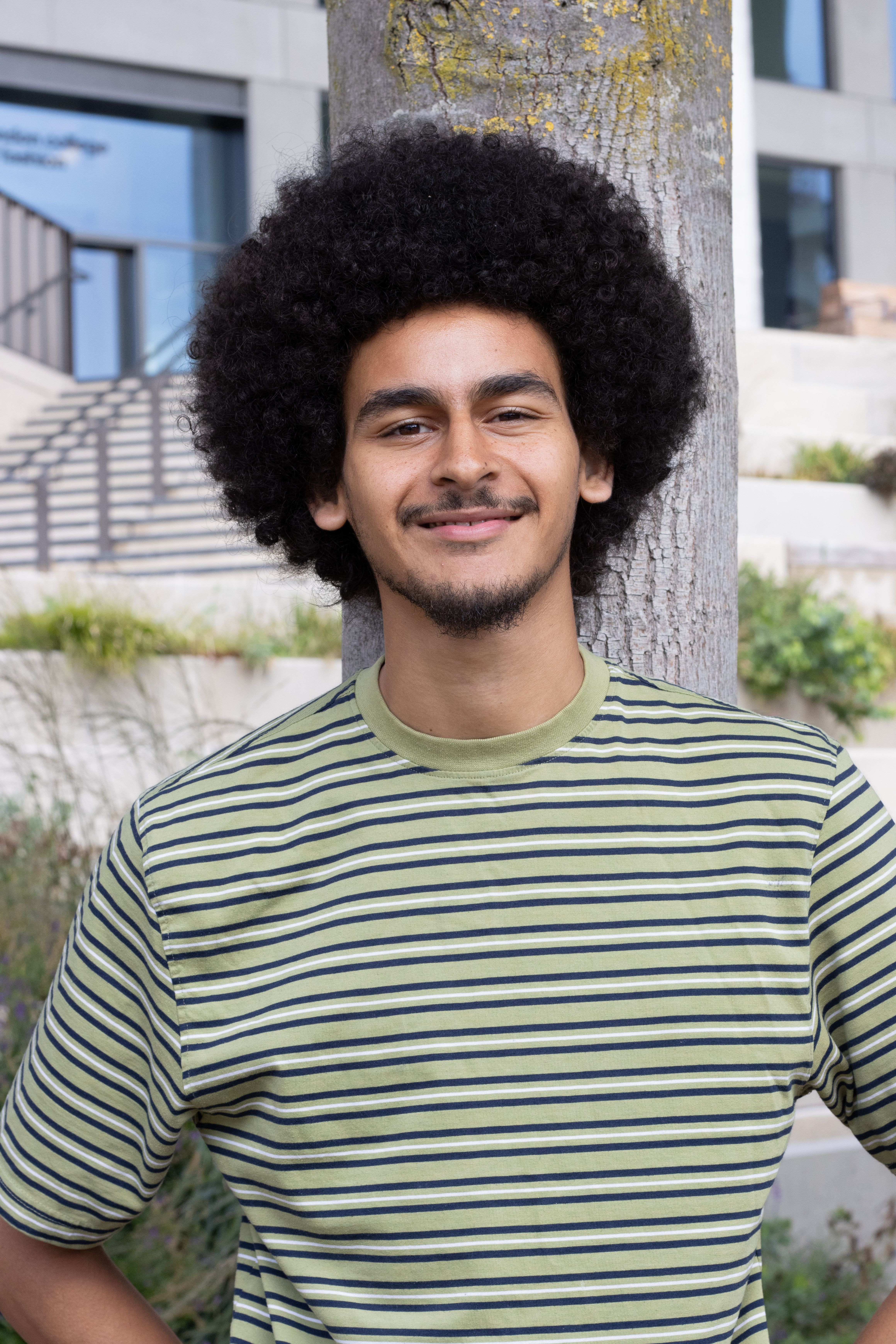  Ismael Ali Nasreldin,, collage artist creating for Black History Month 2025