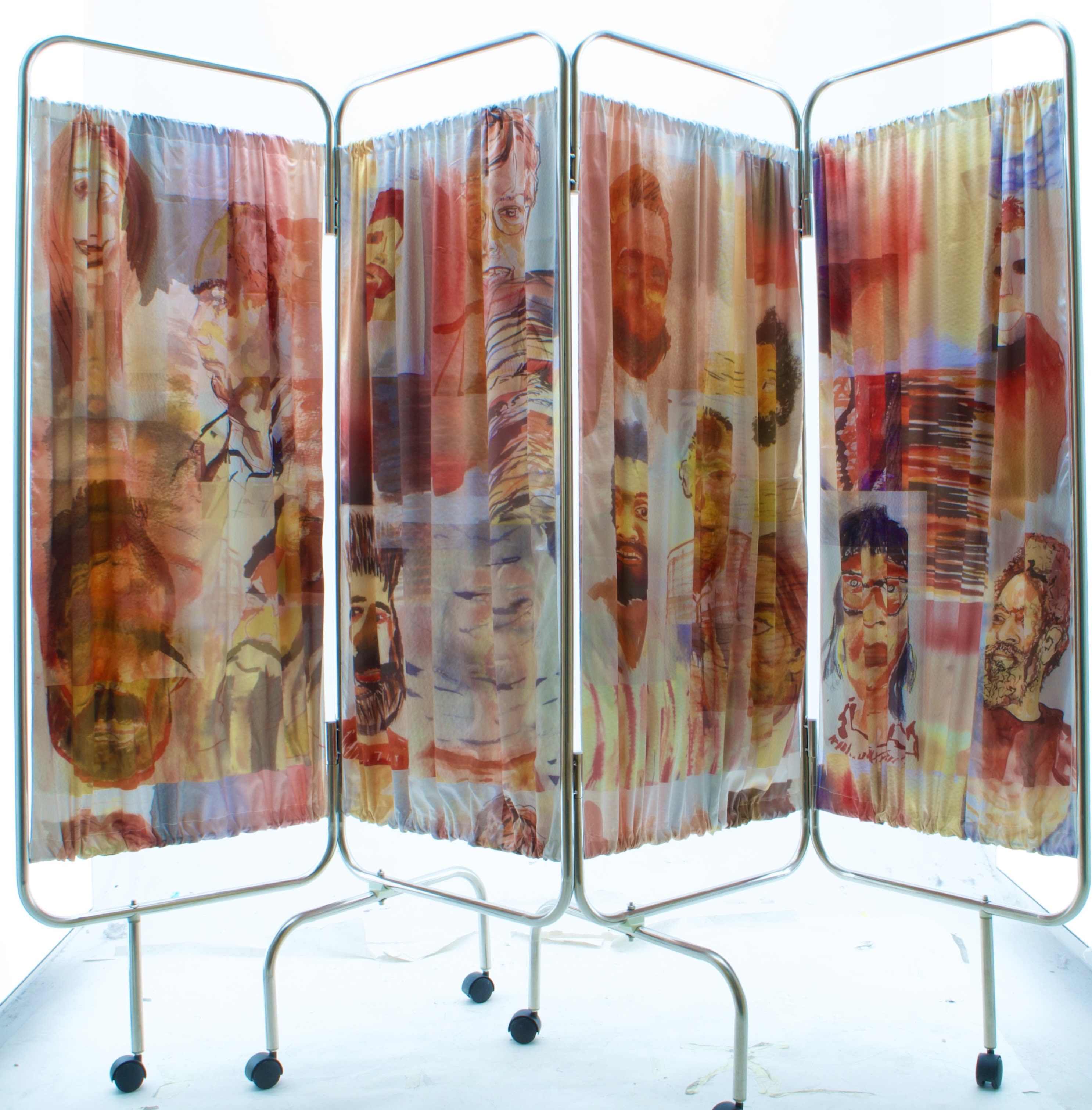 a medical screen with portraits of people printed on it