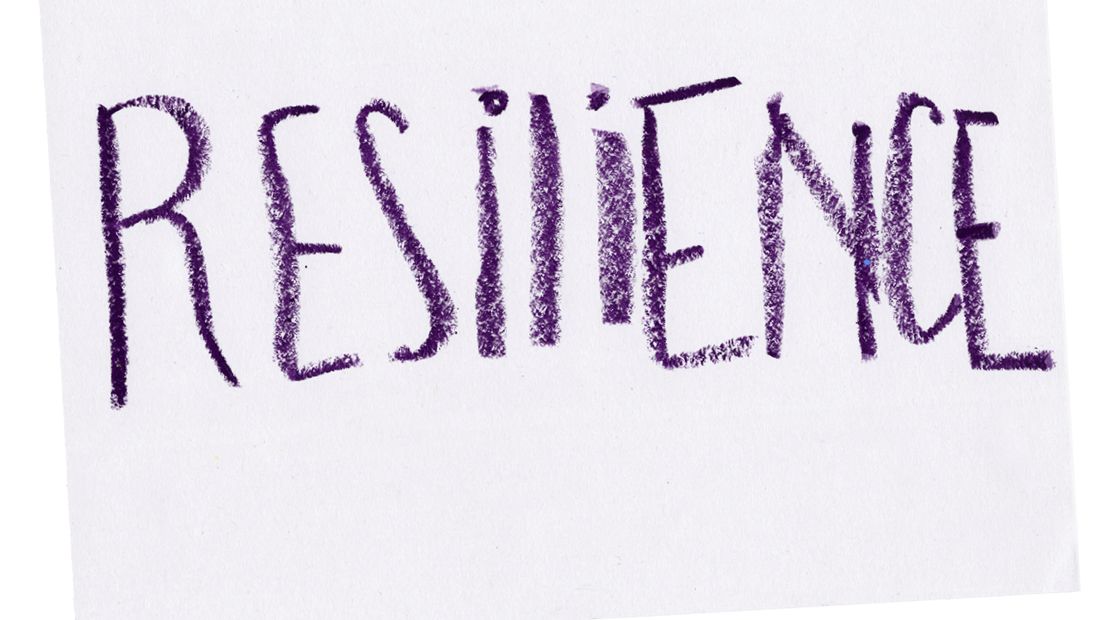 A handwritten sign that says 'Resilience'