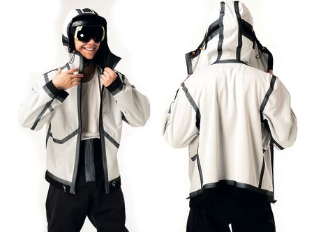 Male model in skiing googles with white sports jacket on