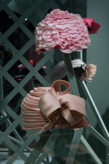 pink hats mounted on stand