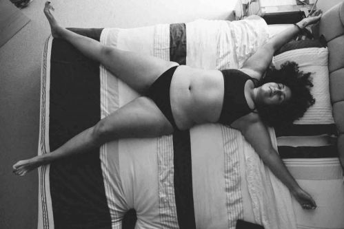 woman in underwear on a bed