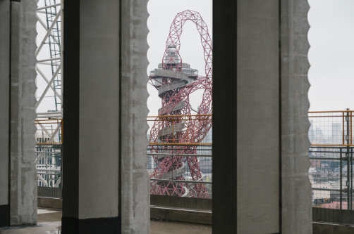 View of the ArcelorMittal Orbit from inside LCF's new building. Photography by Ana Blumenkron.