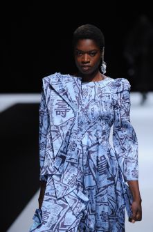 Female model wearing blue suit with geometrical shapes designed by Qianyu Li