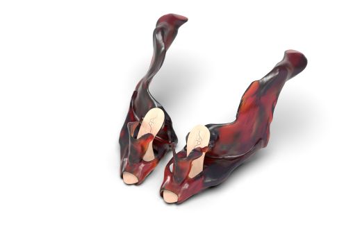 High leg high heeled shoe in orange and tan colours 