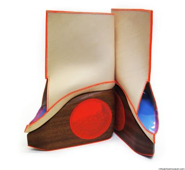 White abstract boot with red and blue detailing