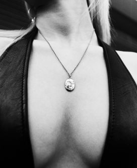 Close up shot of a woman's pendant