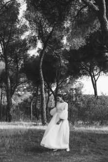 model wearing white wedding dress