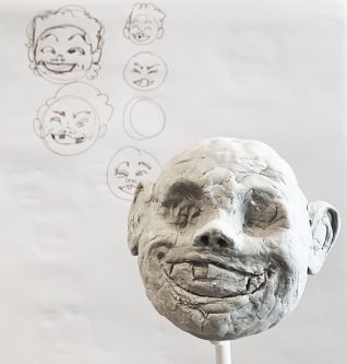 Modelled head in clay.