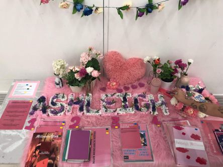 A display of flowers and booklets