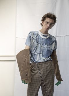 Man in tween zipped trousers