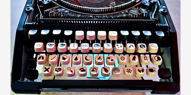 Typewriter with black symbols on keys, replacing letters. 
