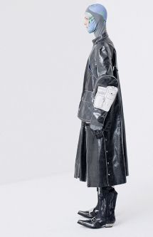 Male in model in black leather coat