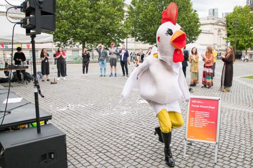 Performer in a chicken outfit during Late at Chelsea