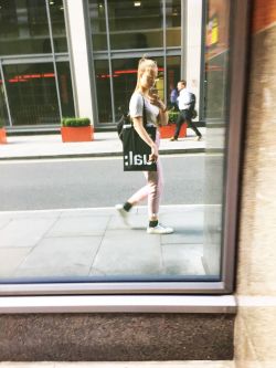 Mandula Pap in London street - reflected in window.