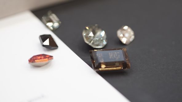 Close up of engraved Swarovski crystals used in Imogen Burgh's rings