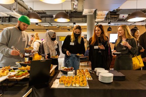 Guests getting food