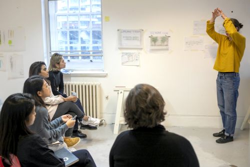 Students exhibiting in classroom.
