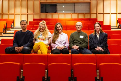 The five speakers in the lecture theatre at Camberwell