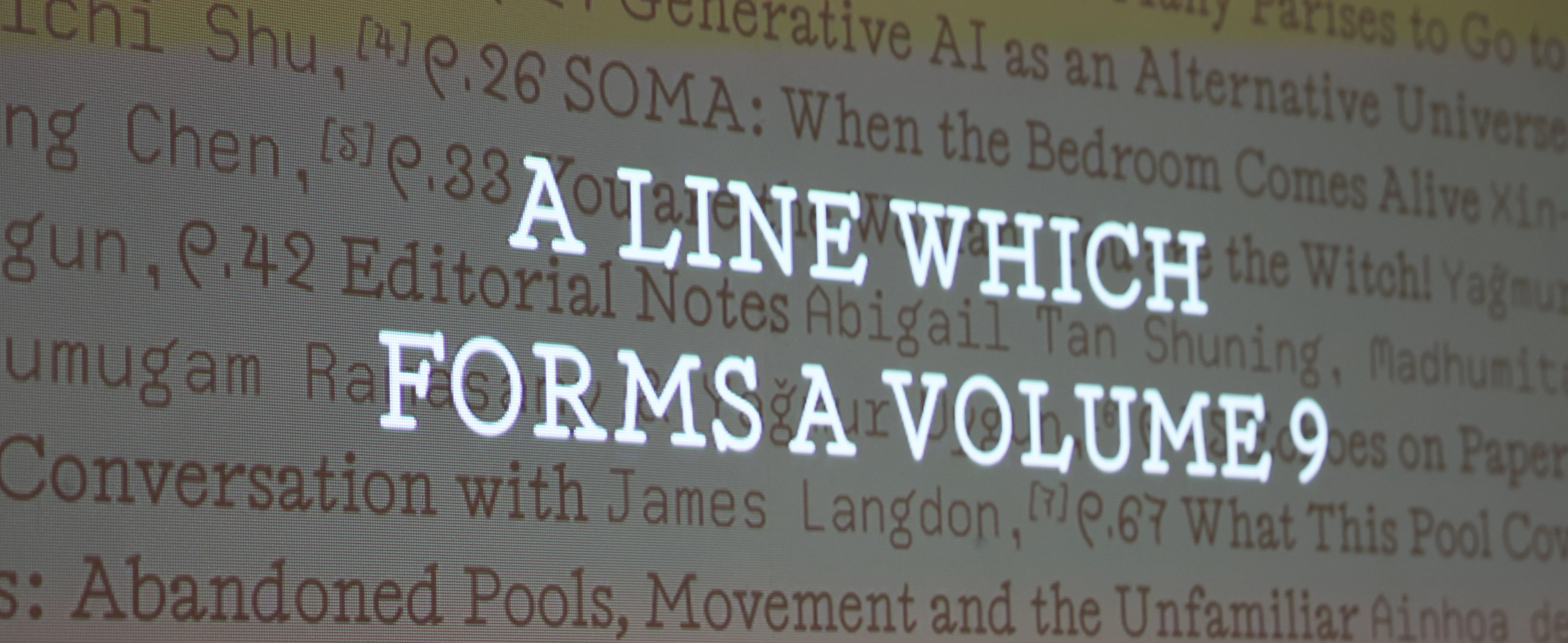 A digital screen with rows of text in an old-school computer font, with a grey overlay and overlaid with larger text in whitecaps reading 