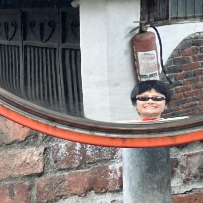 Xiaowan  Yi