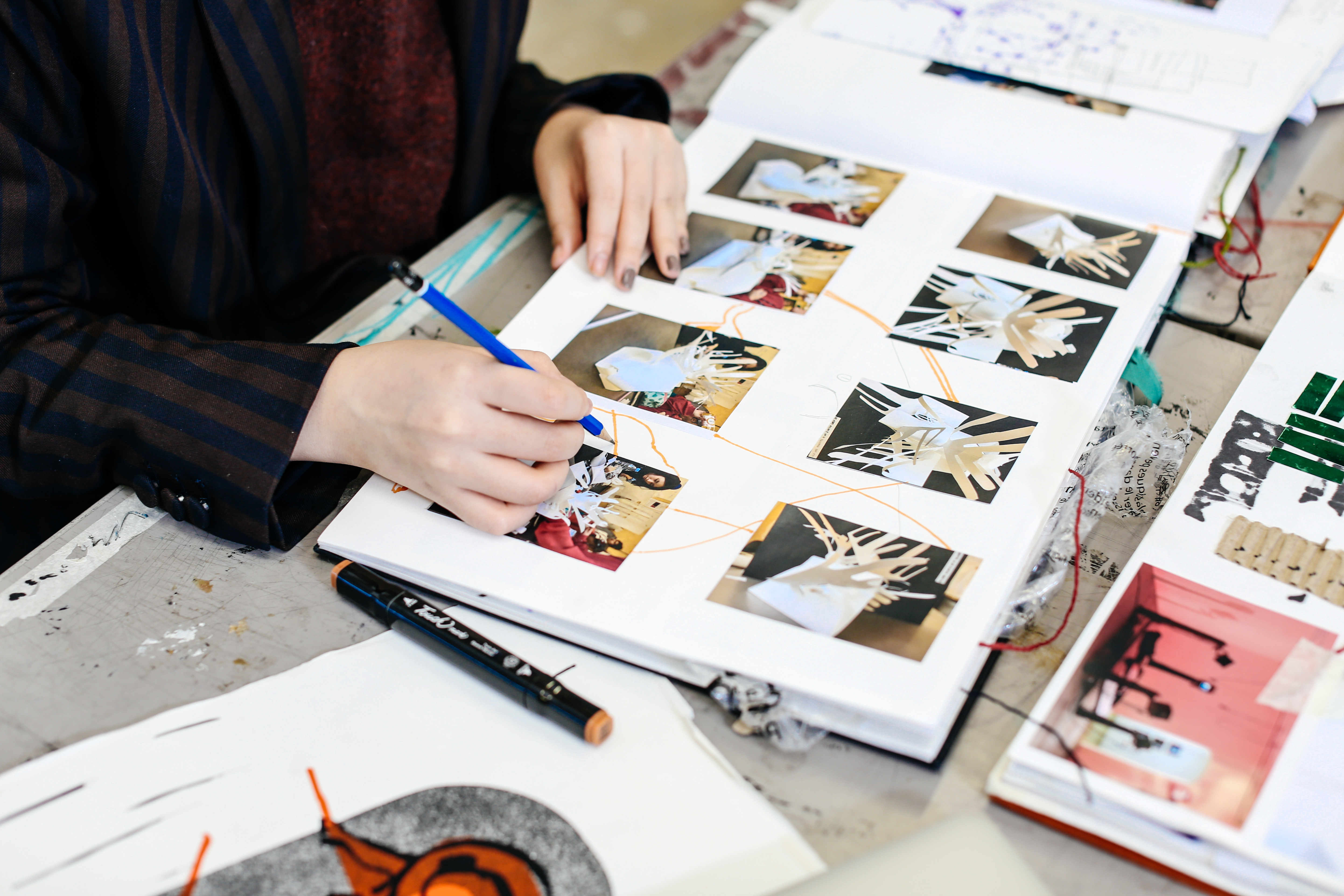 Student working in sketchbook