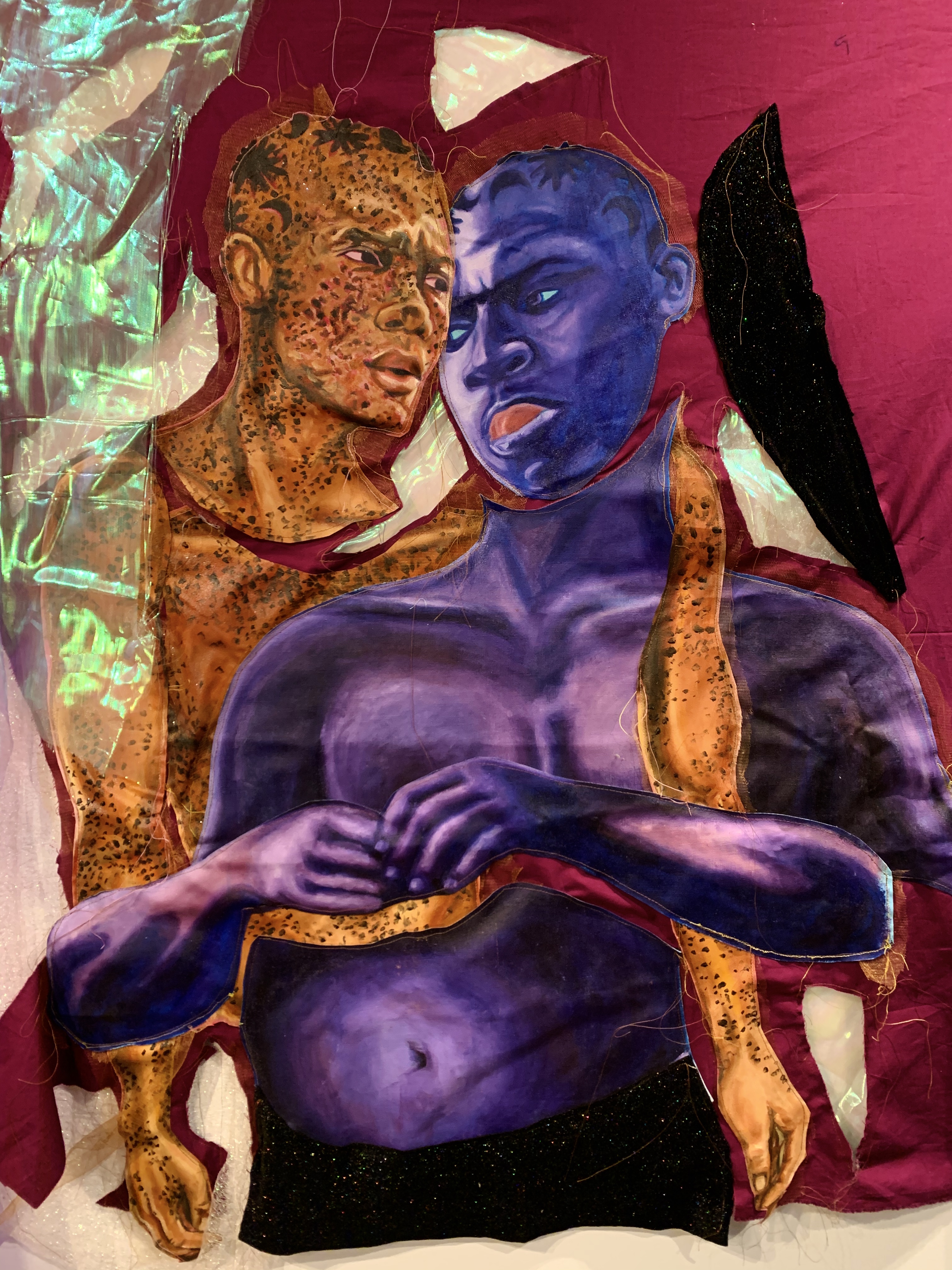 Artwork by Liana Ambrose-Murray of figures on fabric