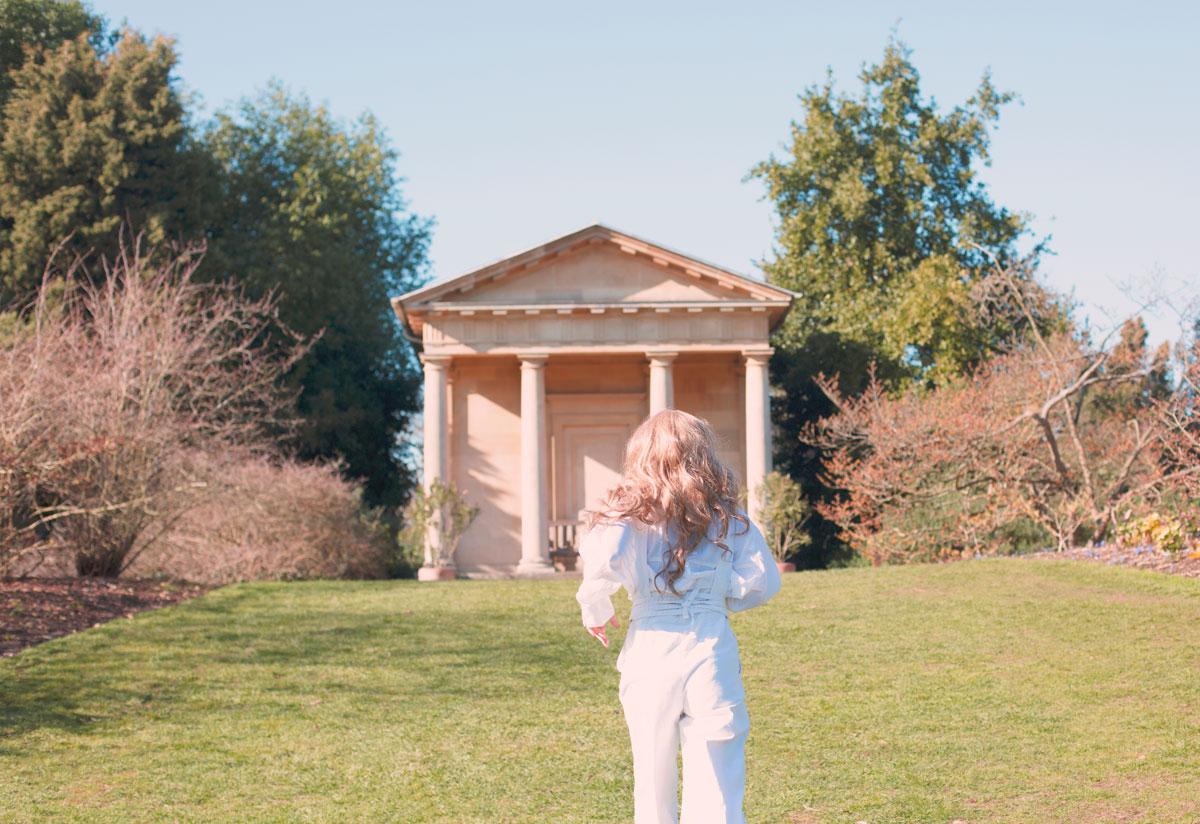 woman running in garden