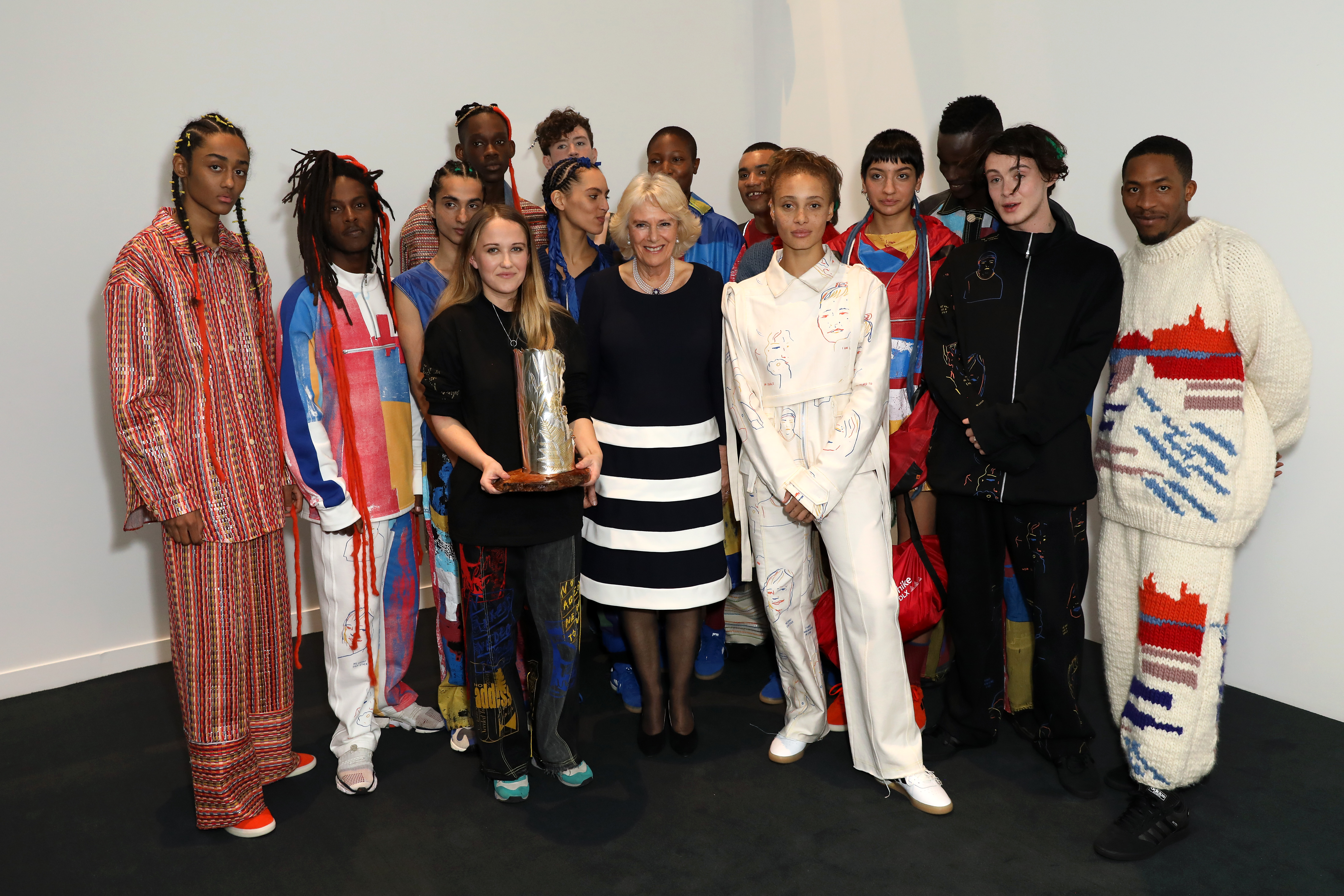 Bethany Williams, HRH The Duchess of Cornwall and models backstage