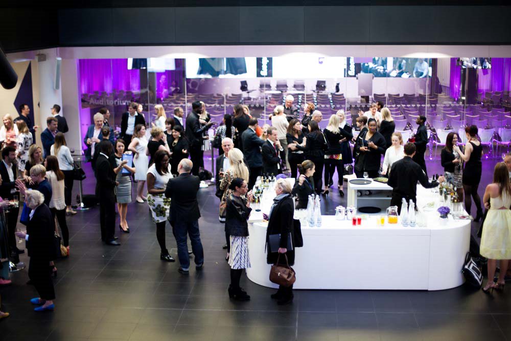 People gathering at a conference