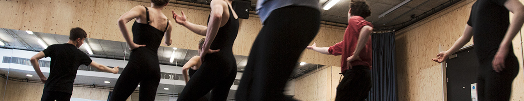 Students practicing in a performance studio