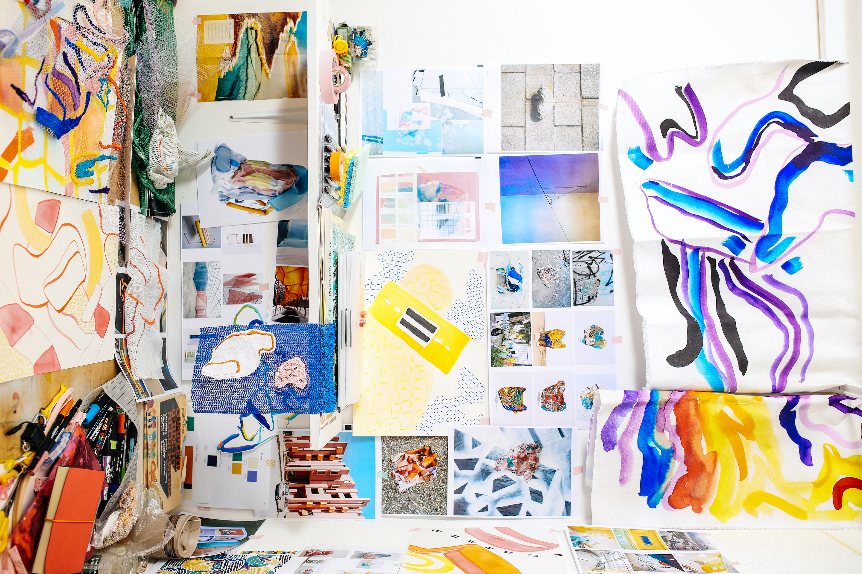 A colourful collage with textiles