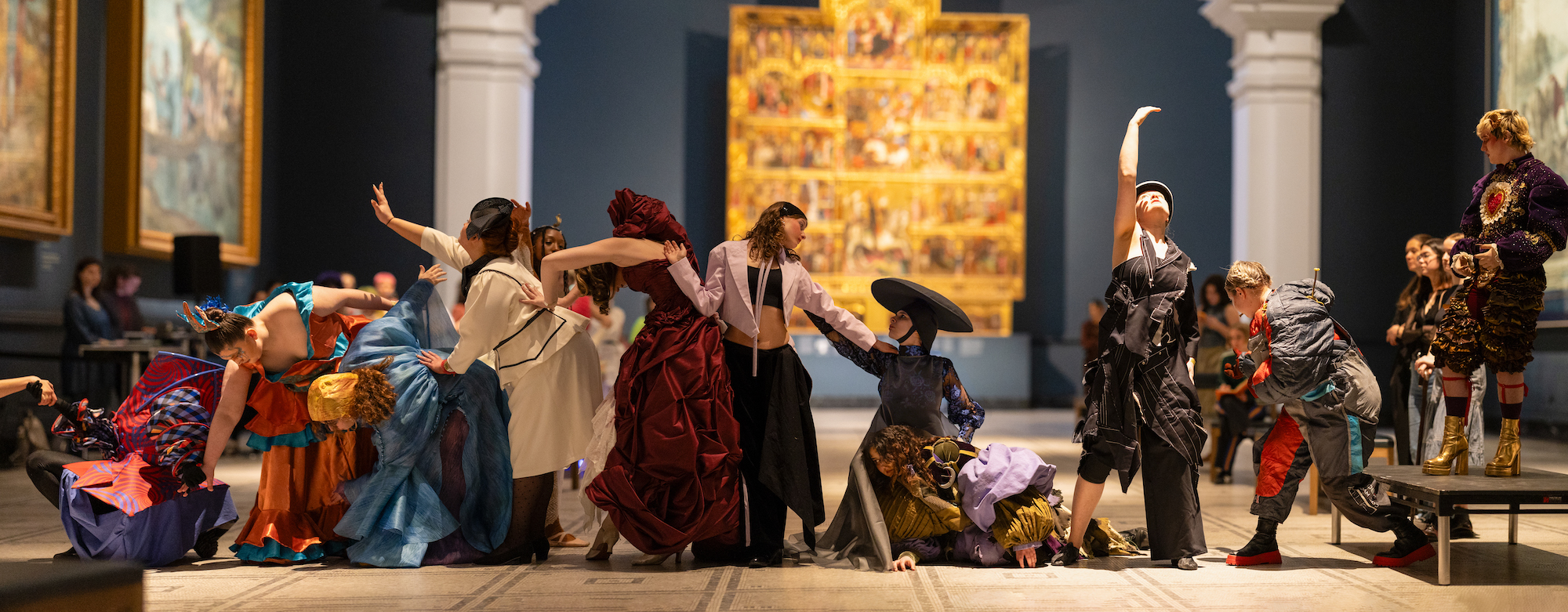 Performers in an art gallery