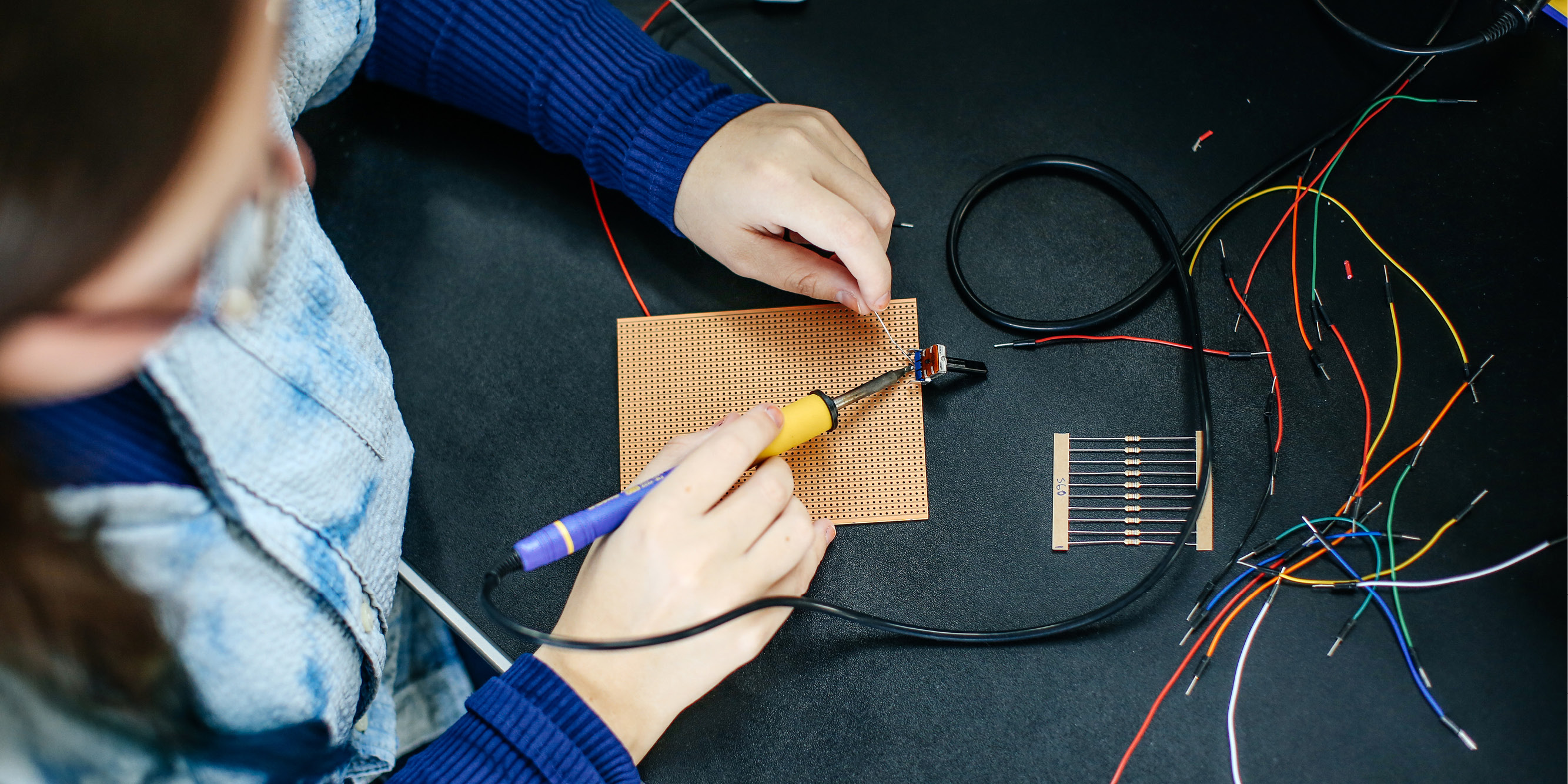 Image of Lucie Brosson soldering