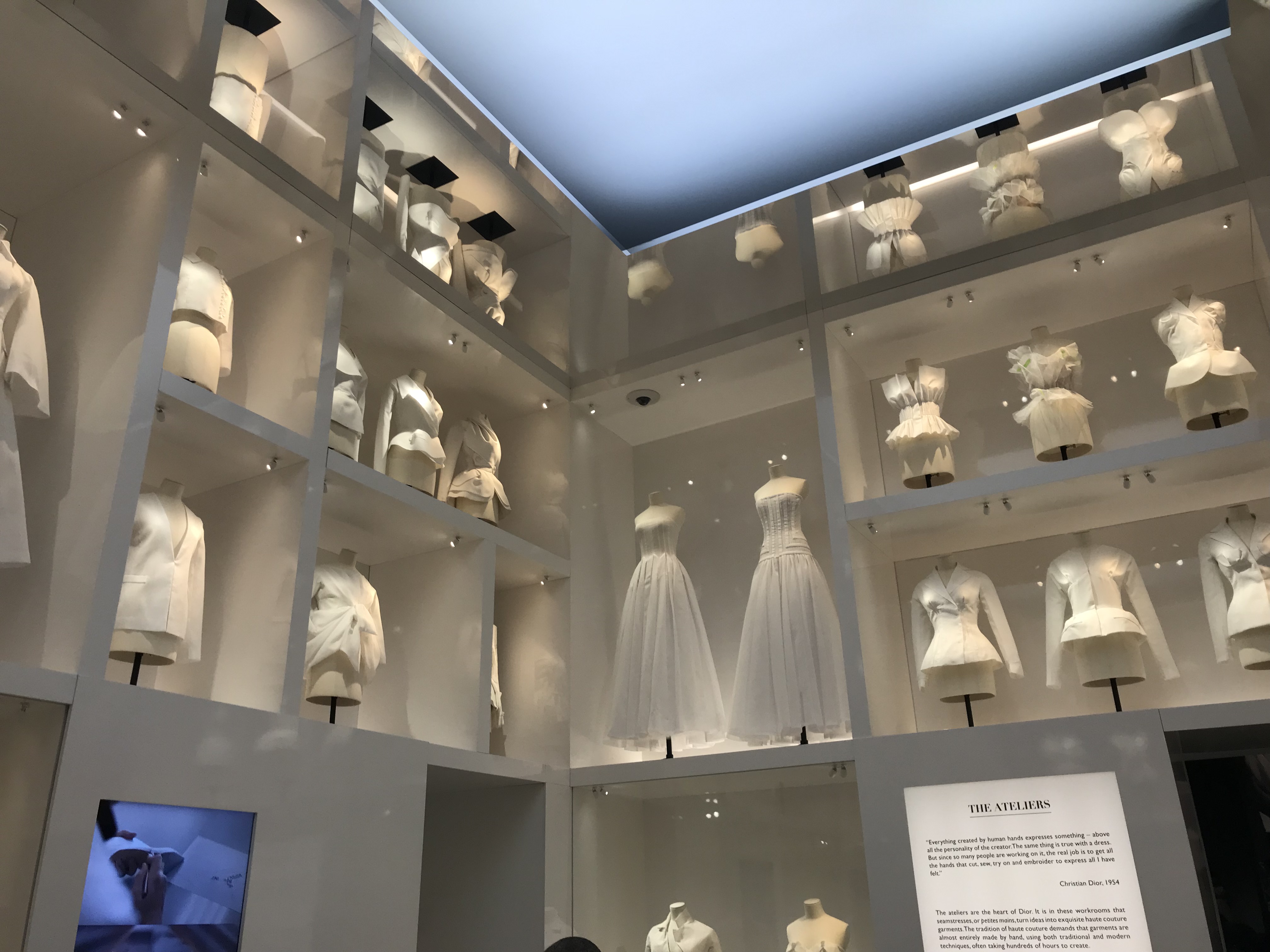 View of toile dresses in cabinets