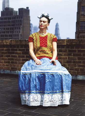 Kahlo in Tehuana dress on a New York City rooftop, 1939 by Nickolas Muray