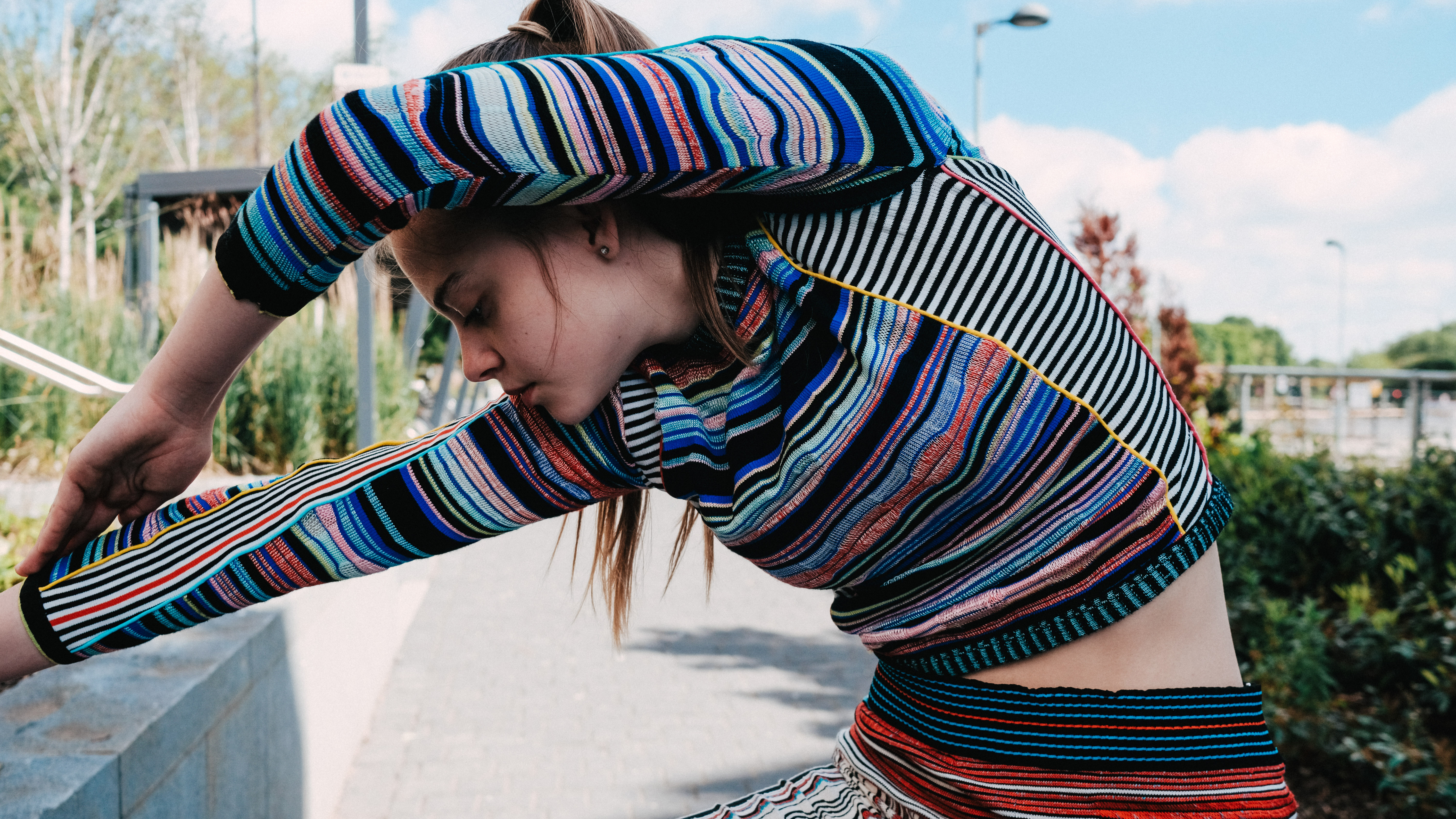 Colourful stripey sportswear knit top and bottom on model by Priscilla Luong - BA Textile Design.