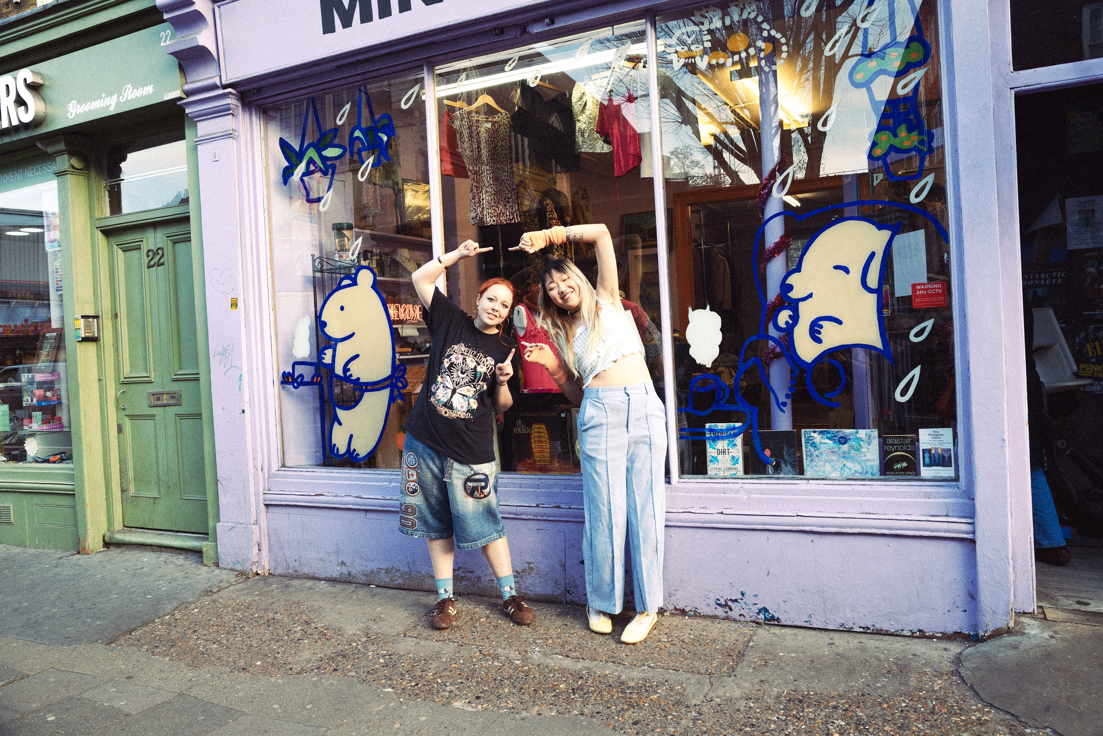 Two people, members of Silly Dogs, outside Mind in Camden